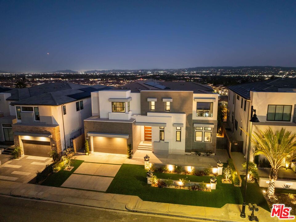20524 Shelley Lane Porter Ranch, CA 91326 - Photo 67 of 73 a view of a terrace with chairs