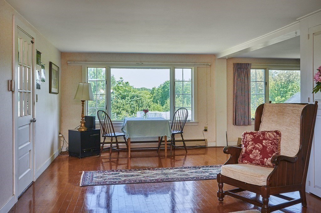416 Bay Road Amherst, MA 01002 - Photo 11 of 42 a living room with furniture and a large window