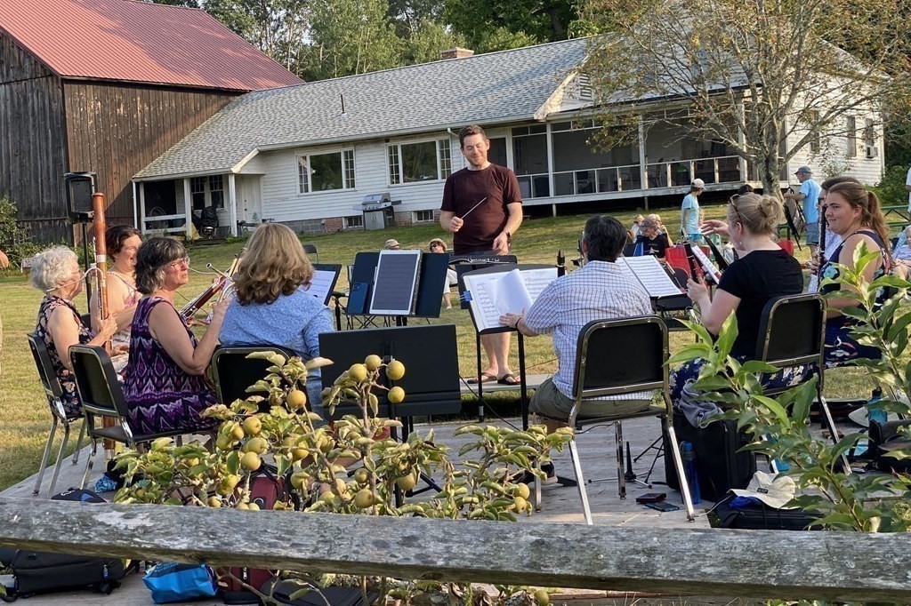 416 Bay Road Amherst, MA 01002 - Photo 34 of 42 a group of people sitting outside of a house