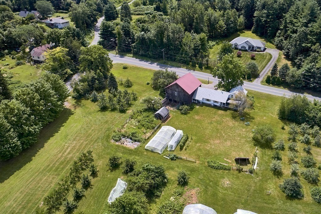 416 Bay Road Amherst, MA 01002 - Photo 39 of 42 an aerial view of residential house with swimming pool and green space
