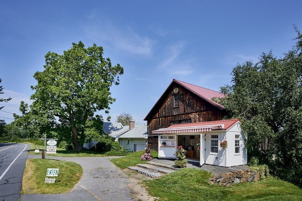 416 Bay Road Amherst, MA 01002 - Photo 7 of 42 front view of a house with a yard