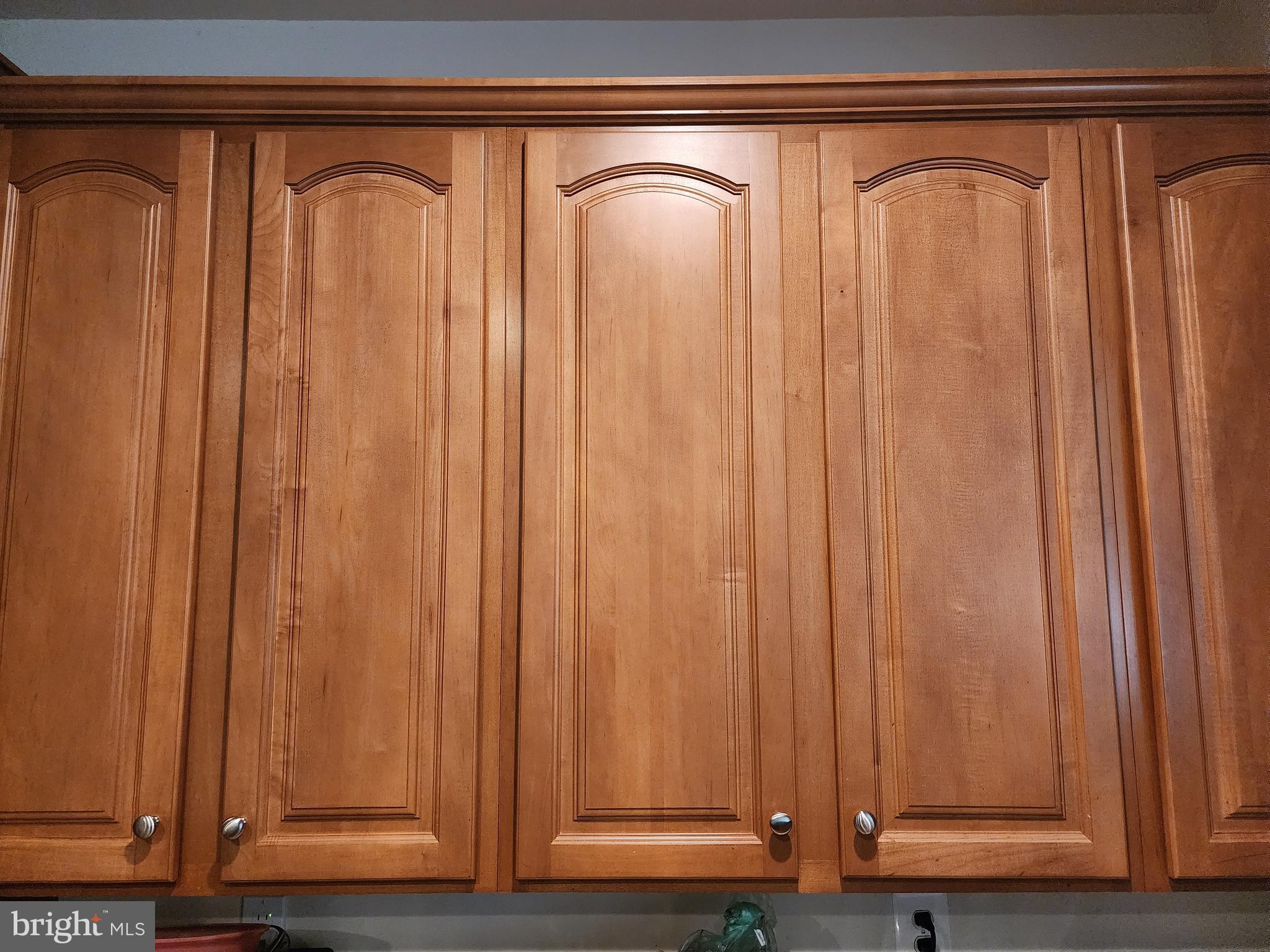 9815 Oxbridge Way Bowie, MD 20721 - Photo 11 of 28 a view of a large window with wooden walls