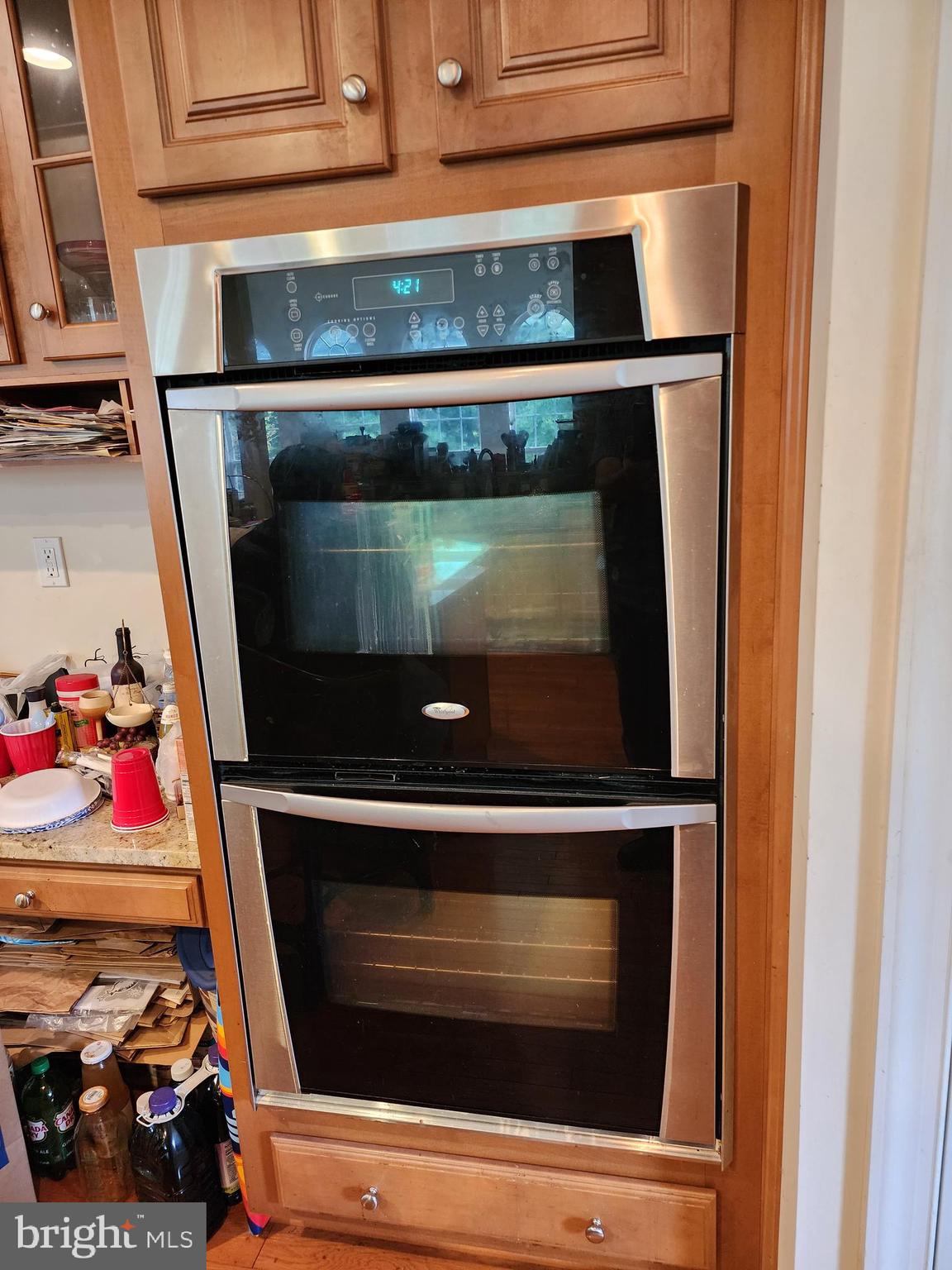 9815 Oxbridge Way Bowie, MD 20721 - Photo 12 of 28 a stove top oven sitting inside of a kitchen