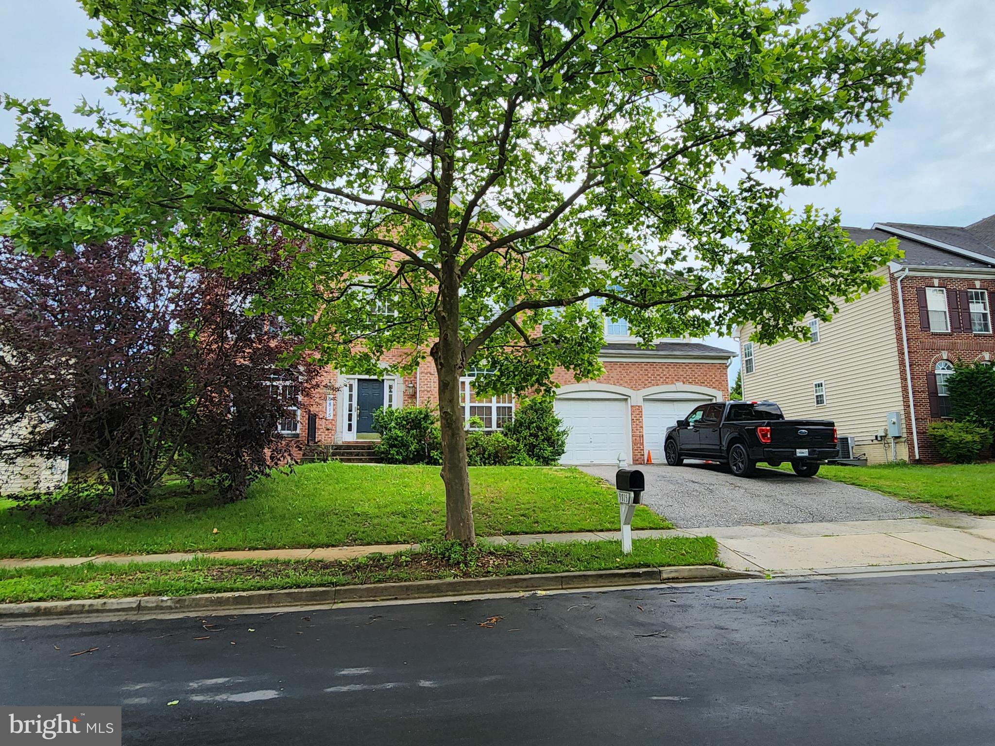 9815 Oxbridge Way Bowie, MD 20721 - Photo 27 of 28 a view of a house with a garden
