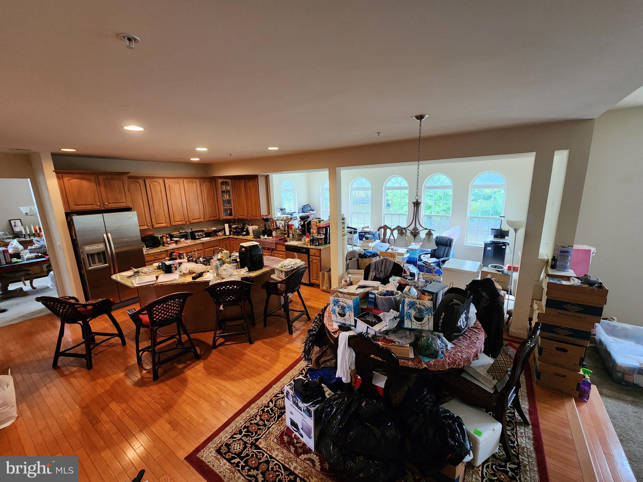 9815 Oxbridge Way Bowie, MD 20721 - Photo 3 of 28 a view of a dining room with furniture window and outside view
