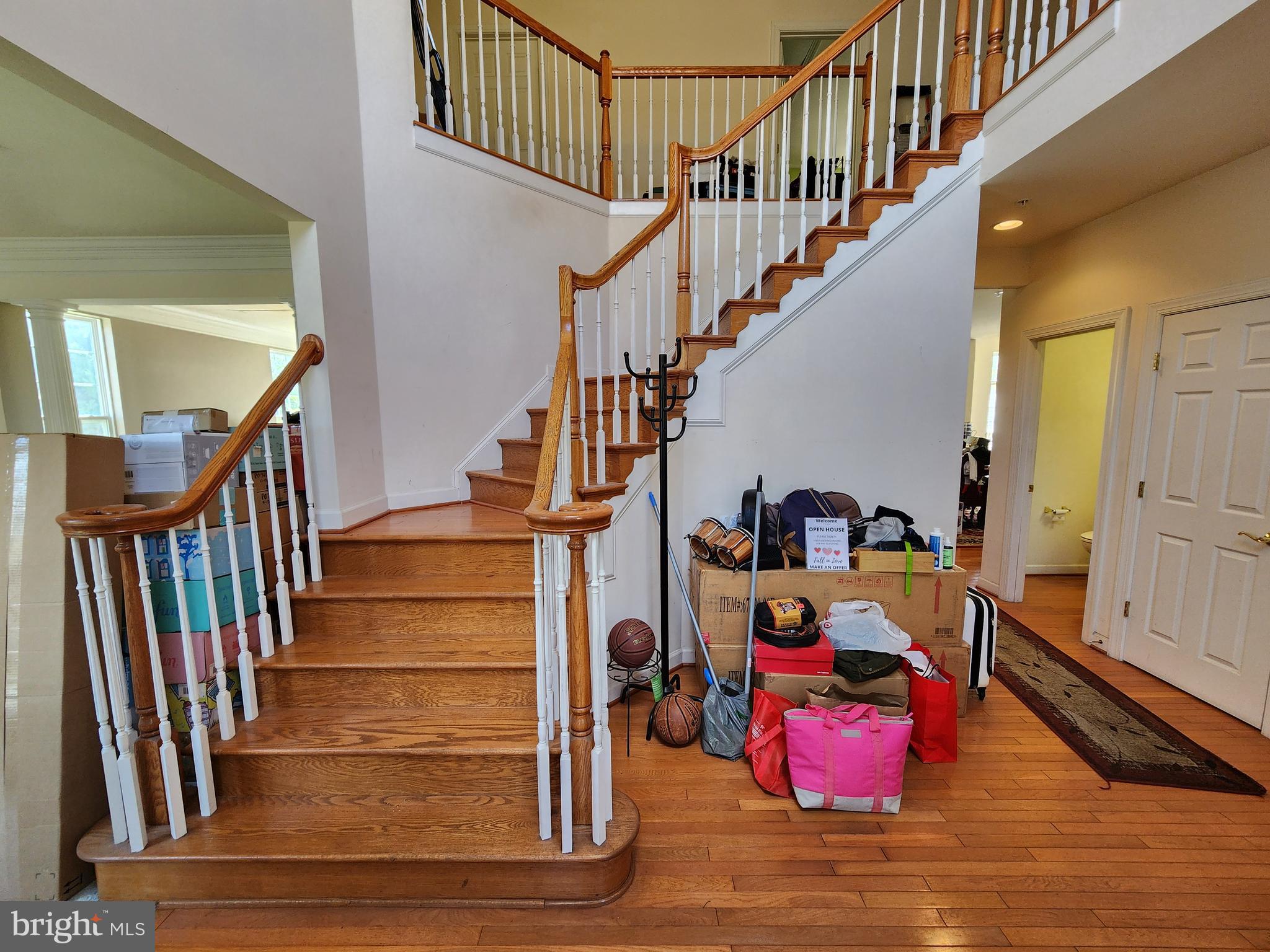 9815 Oxbridge Way Bowie, MD 20721 - Photo 4 of 28 a view of entryway livingroom and hall with wooden floor