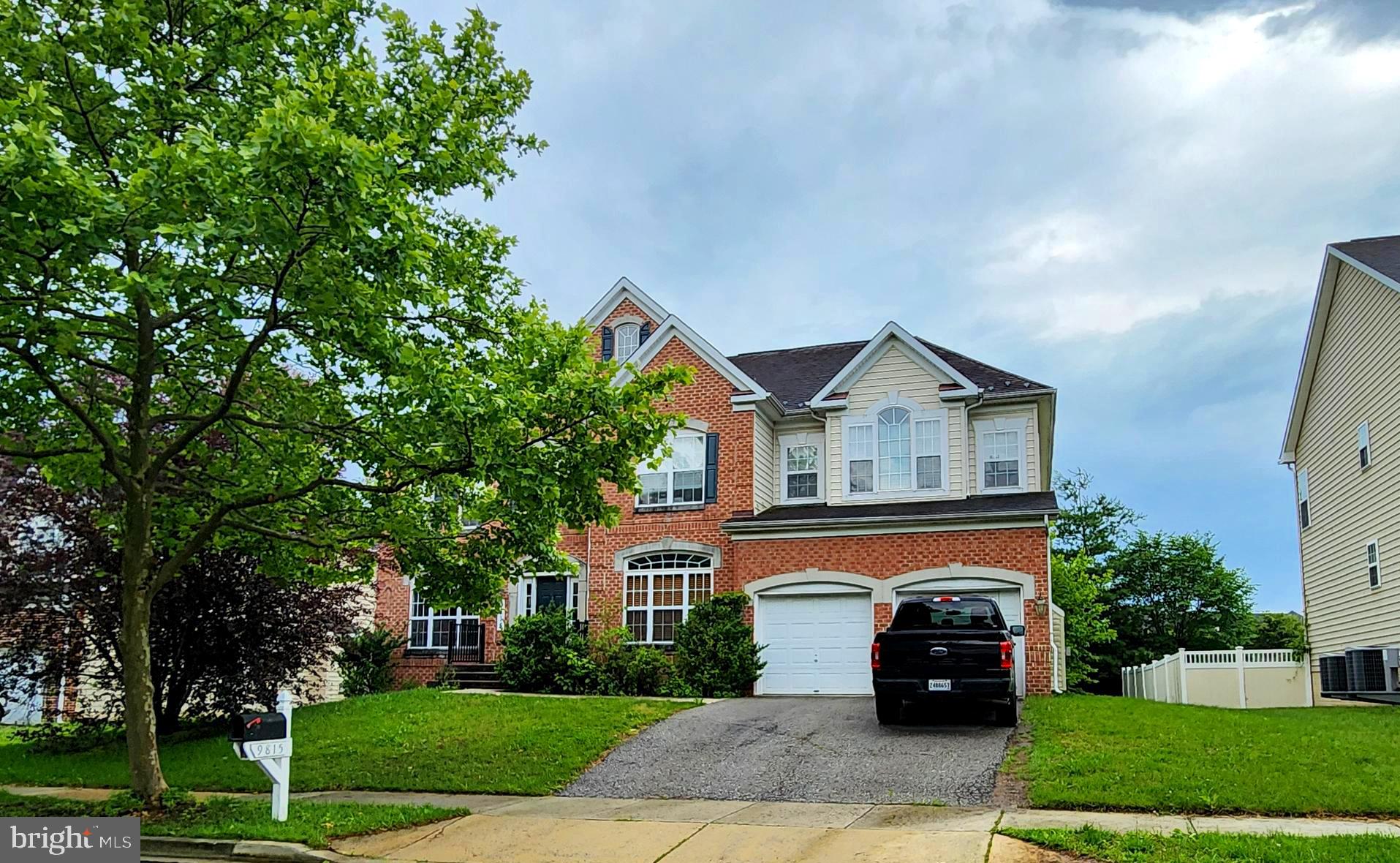 9815 Oxbridge Way Bowie, MD 20721 - Photo 6 of 28 a house view with a outdoor space