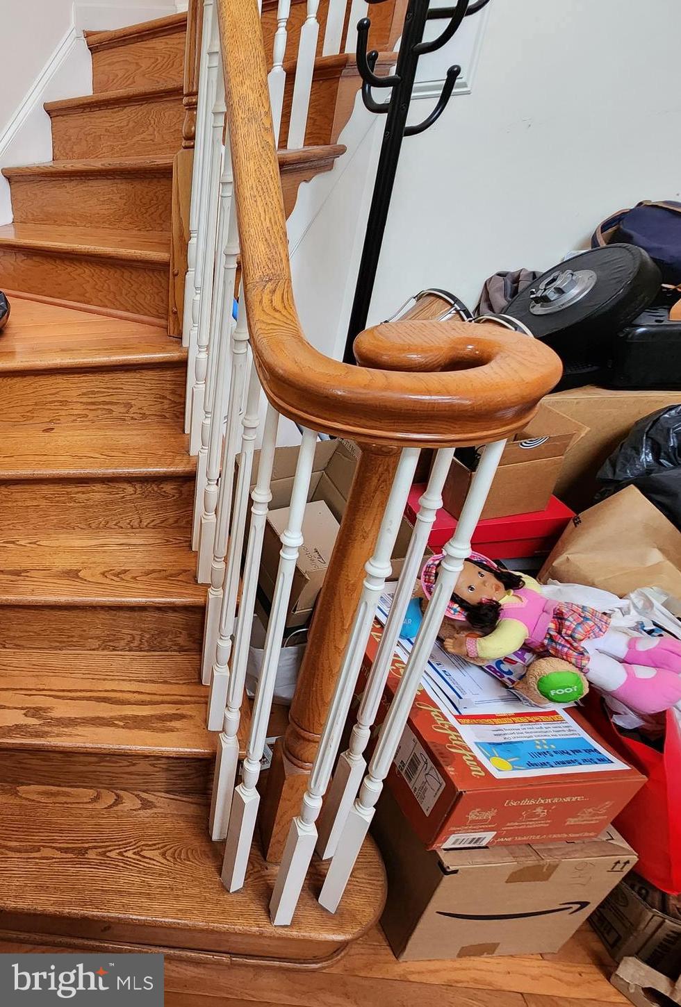 9815 Oxbridge Way Bowie, MD 20721 - Photo 7 of 28 a view of entryway with rug and stairs