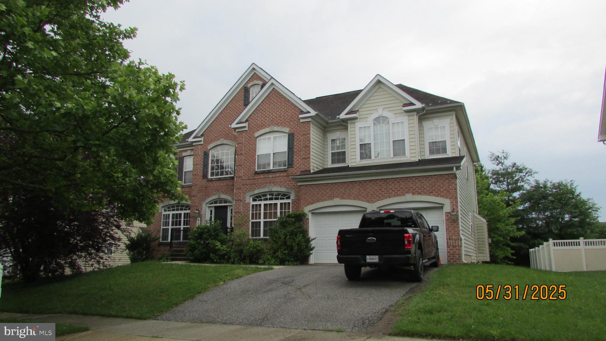 9815 Oxbridge Way Bowie, MD 20721 - Photo 9 of 28 a car parked in front of a house