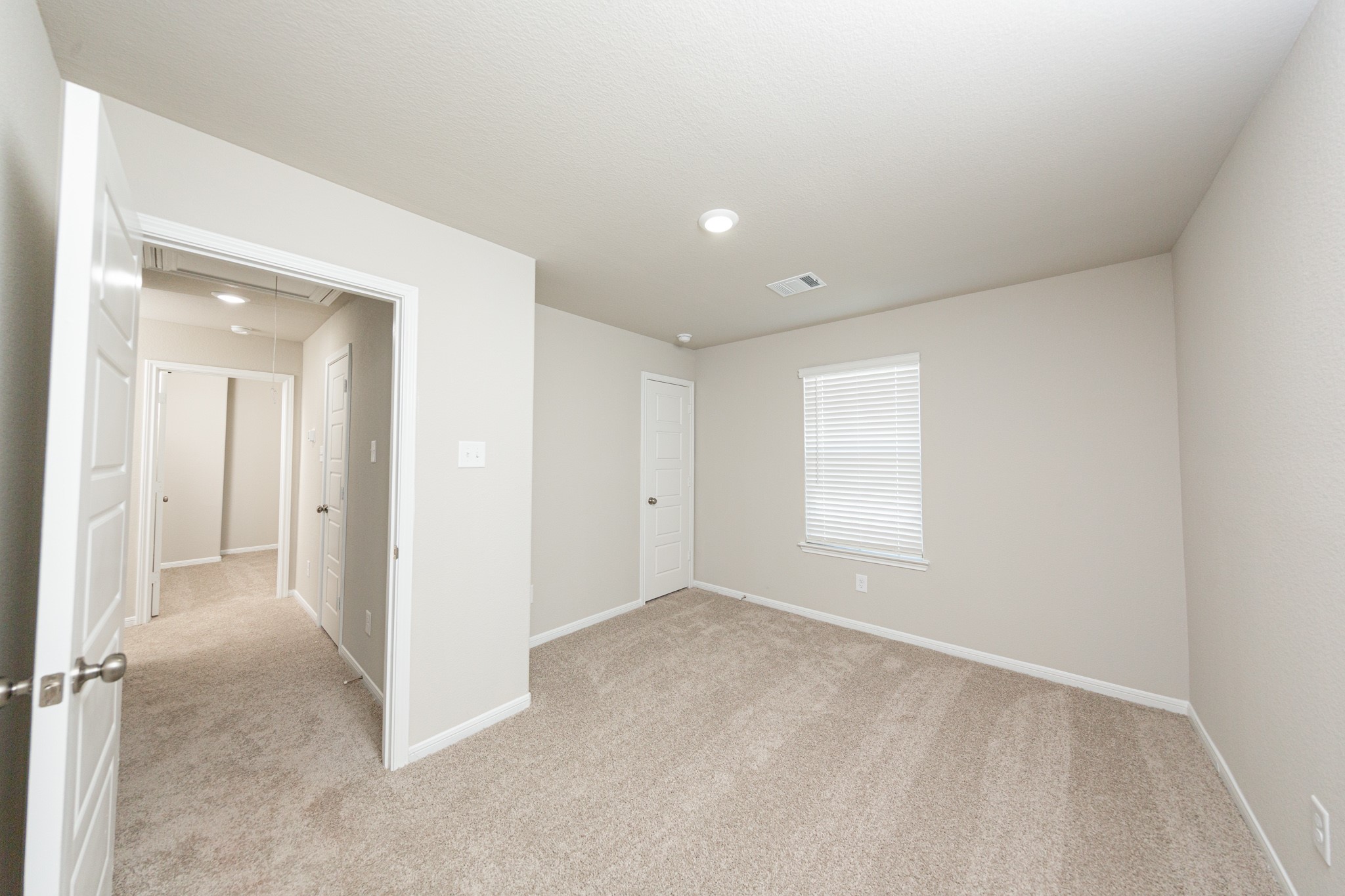 9258 Grace Rdg Drive Willis, TX 77318 - Photo 14 of 24 a view of an empty room with a window
