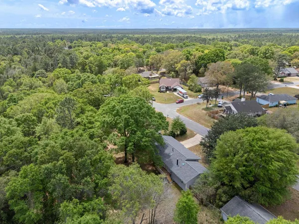 an aerial view of residential house with outdoor space