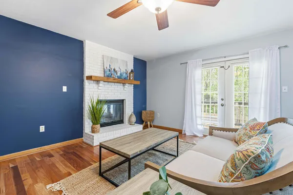 a living room with furniture and a window