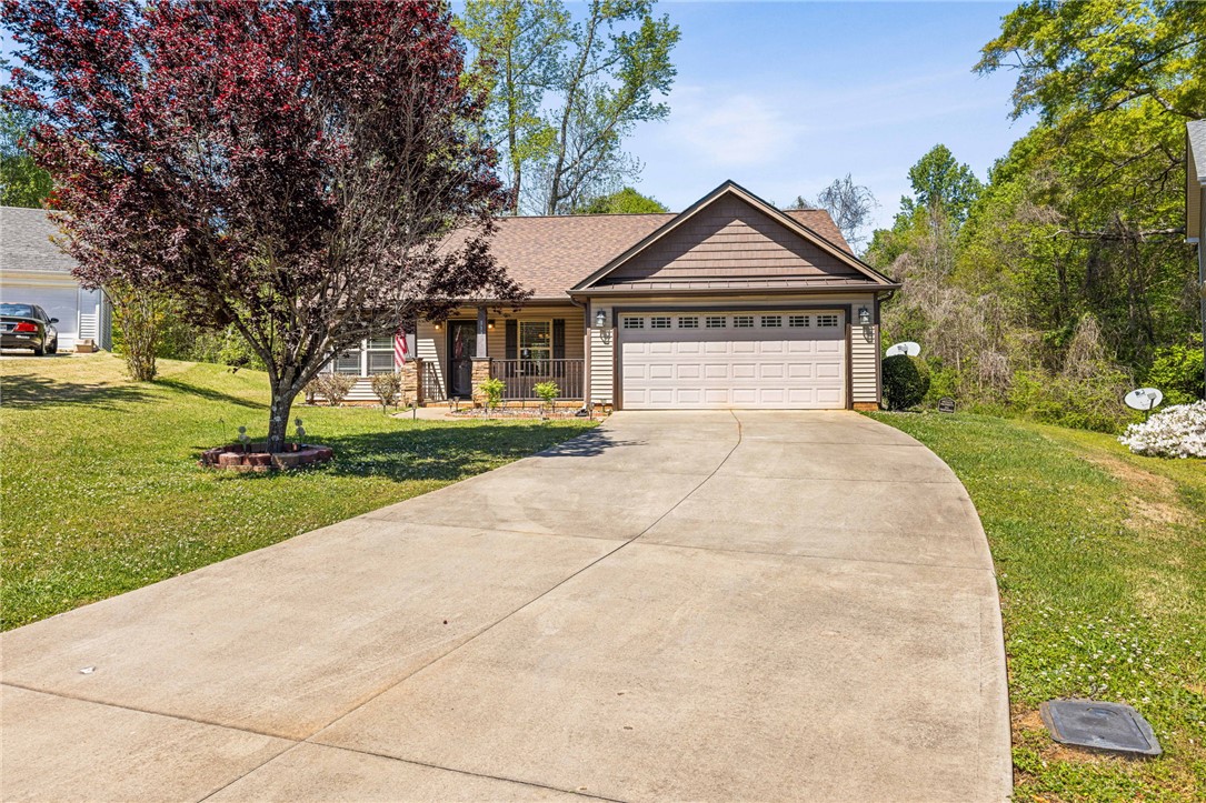 113 Crofton Court Easley, SC 29642 - Photo 2 of 33 This charming home features a welcoming porch and a spacious driveway.