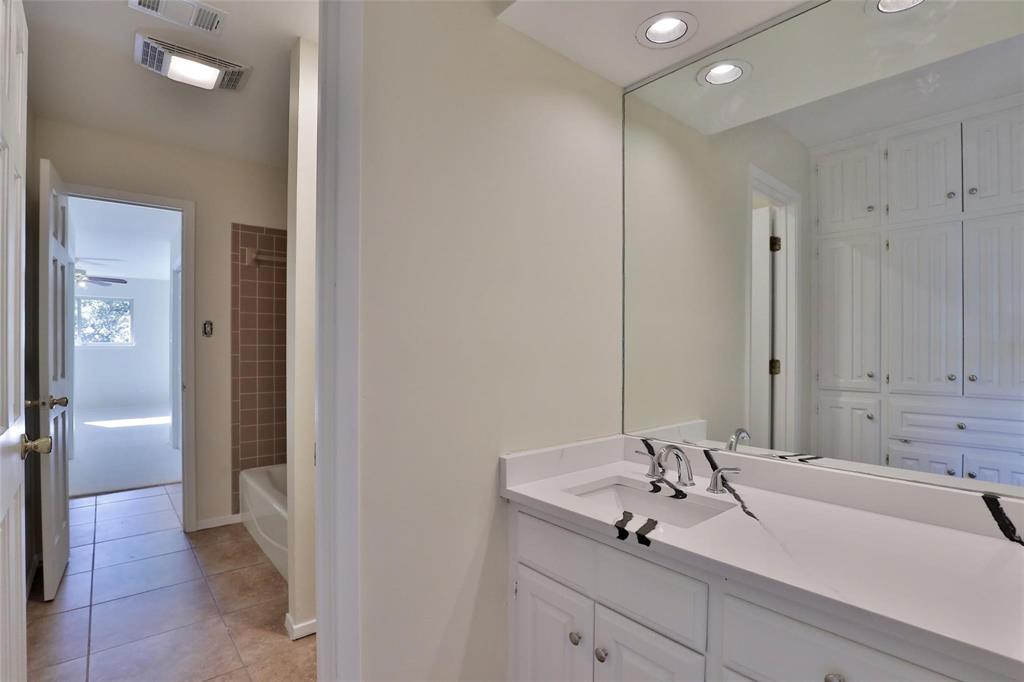 5717 Fm 2647 Winters, TX 79567 - Photo 16 of 37 a bathroom with a sink and a mirror