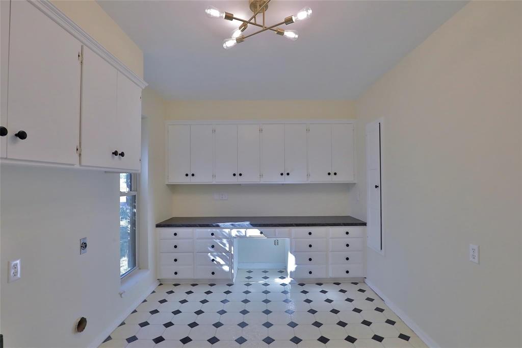 5717 Fm 2647 Winters, TX 79567 - Photo 24 of 37 a bathroom with a sink a toilet and a mirror