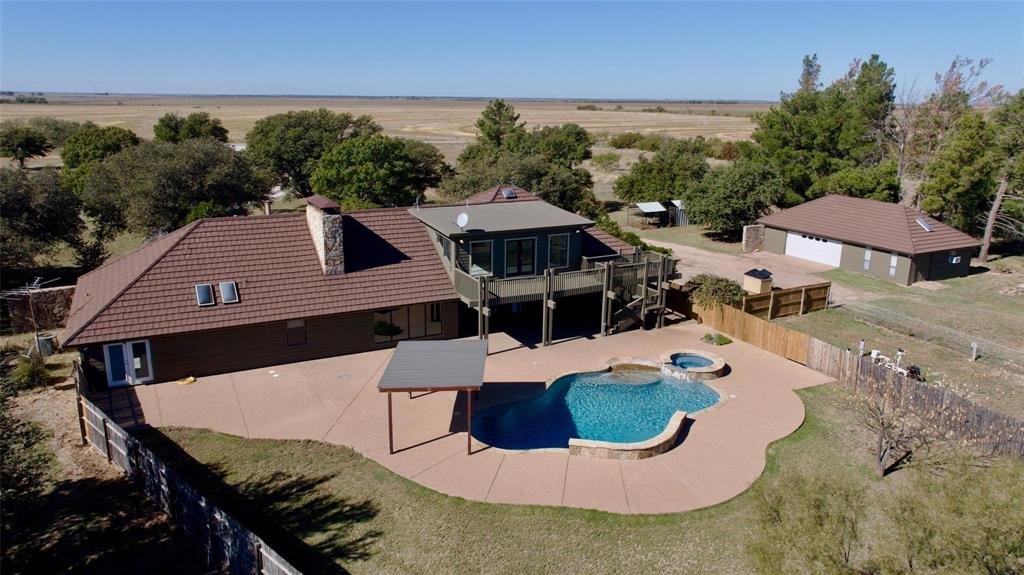 5717 Fm 2647 Winters, TX 79567 - Photo 33 of 37 an aerial view of a house with yard swimming pool and outdoor seating