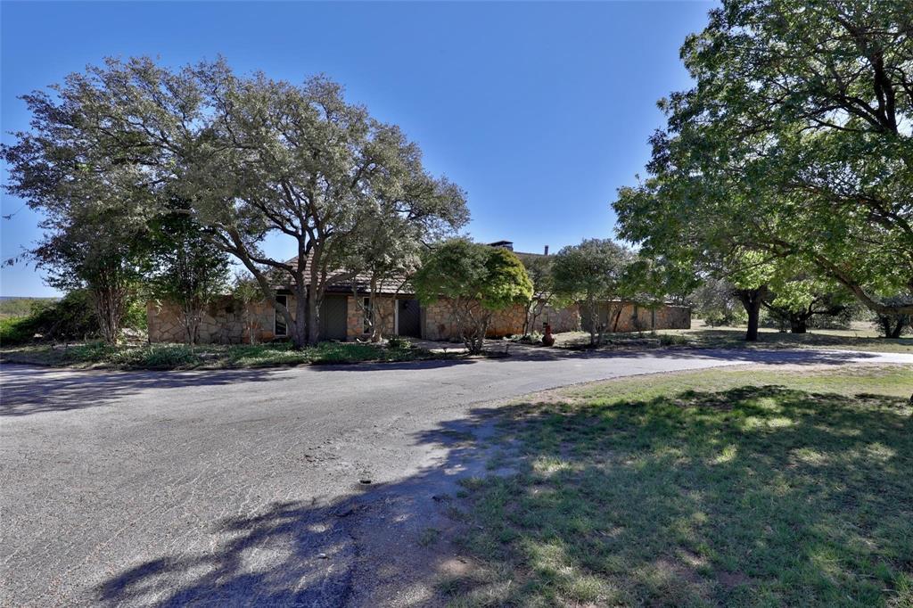 5717 Fm 2647 Winters, TX 79567 - Photo 4 of 37 a view of street with trees