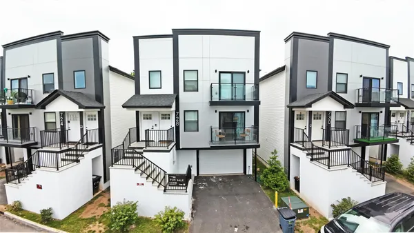 a view of a building with sitting area
