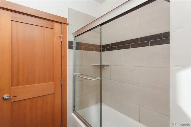 a bathroom with a sink toilet and mirror