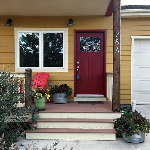 a potted plant sitting on the side of a building