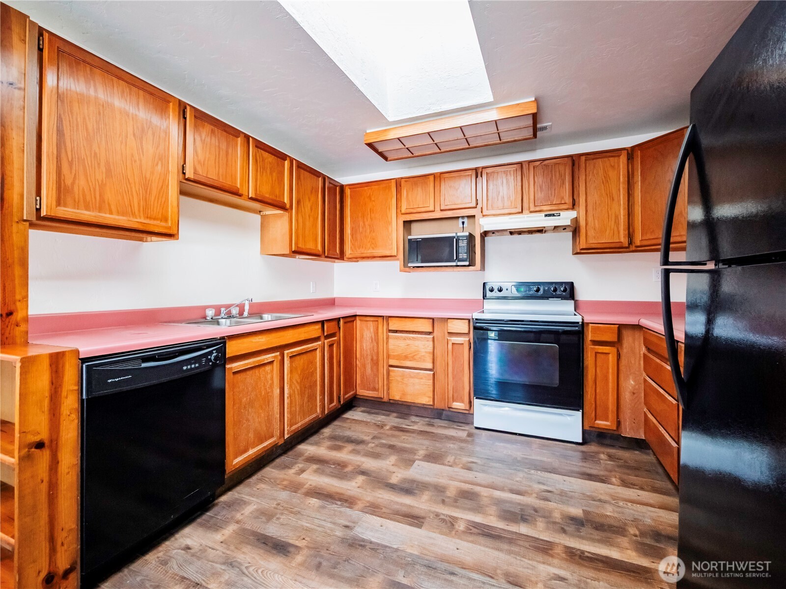 500 Mill Creek Road Southeast Shelton, WA 98584 - Photo 17 of 39 a kitchen with stainless steel appliances granite countertop a stove a sink and a refrigerator