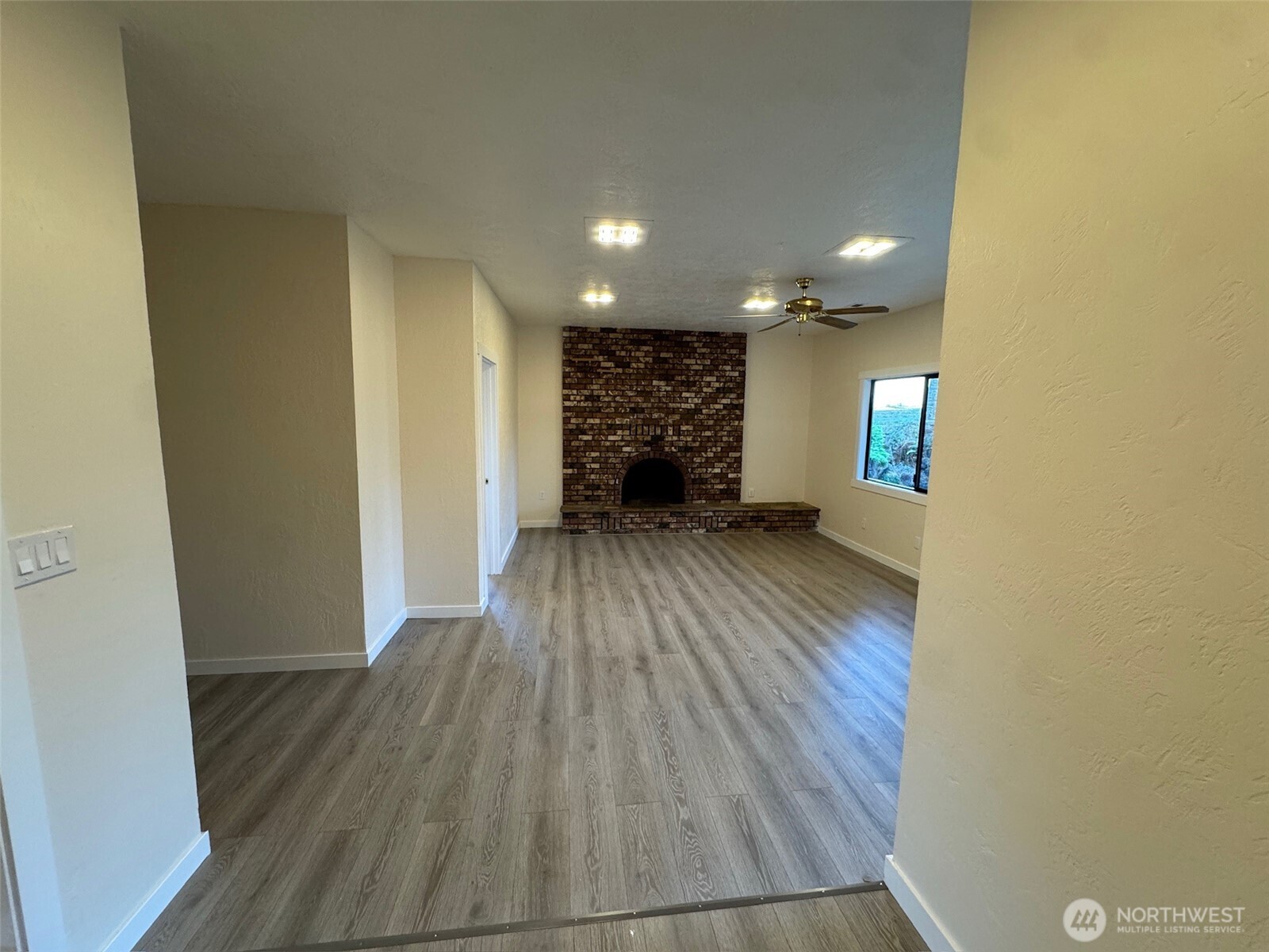 500 Mill Creek Road Southeast Shelton, WA 98584 - Photo 30 of 39 a view of a room with wooden floor and a window