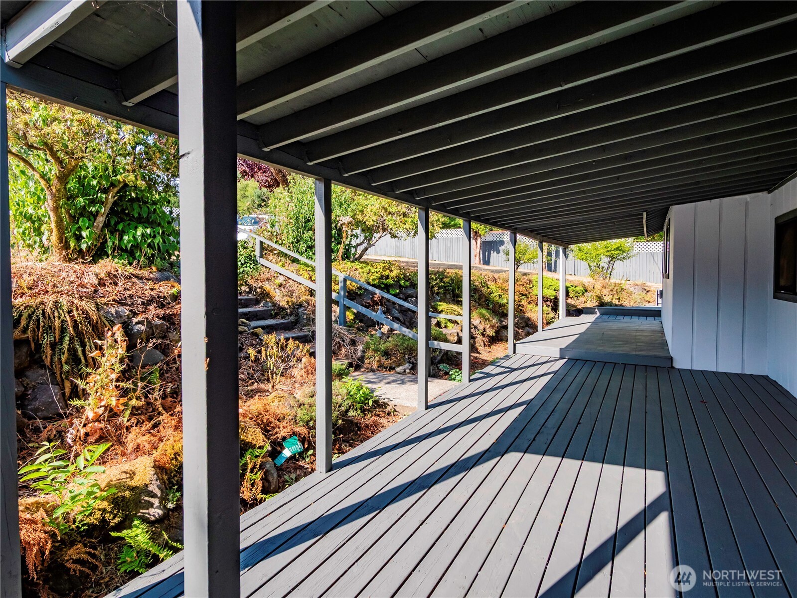 500 Mill Creek Road Southeast Shelton, WA 98584 - Photo 34 of 39 a view of backyard with a deck and wooden floor