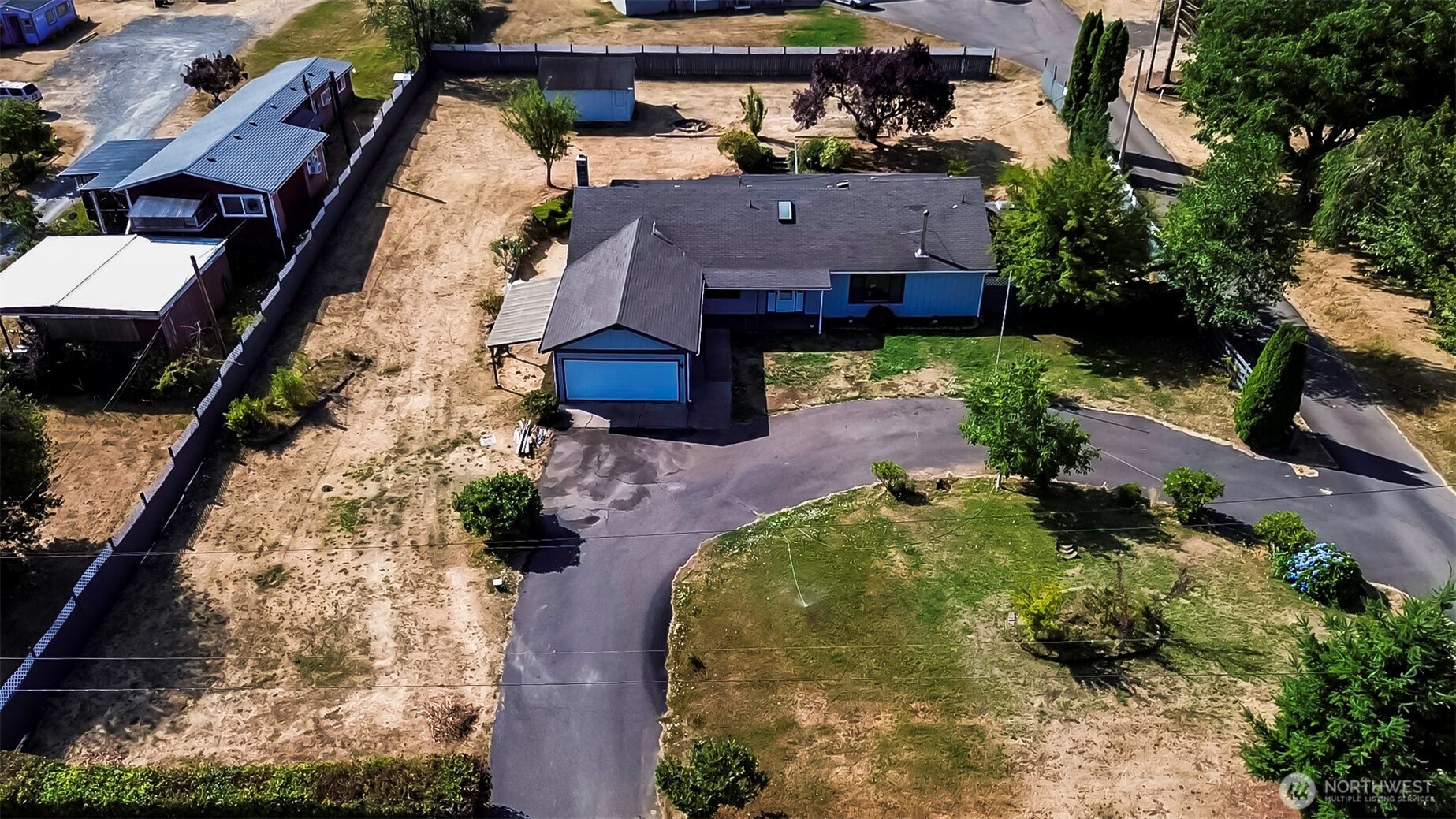 500 Mill Creek Road Southeast Shelton, WA 98584 - Photo 38 of 39 an aerial view of a house with a yard basket ball court and outdoor seating