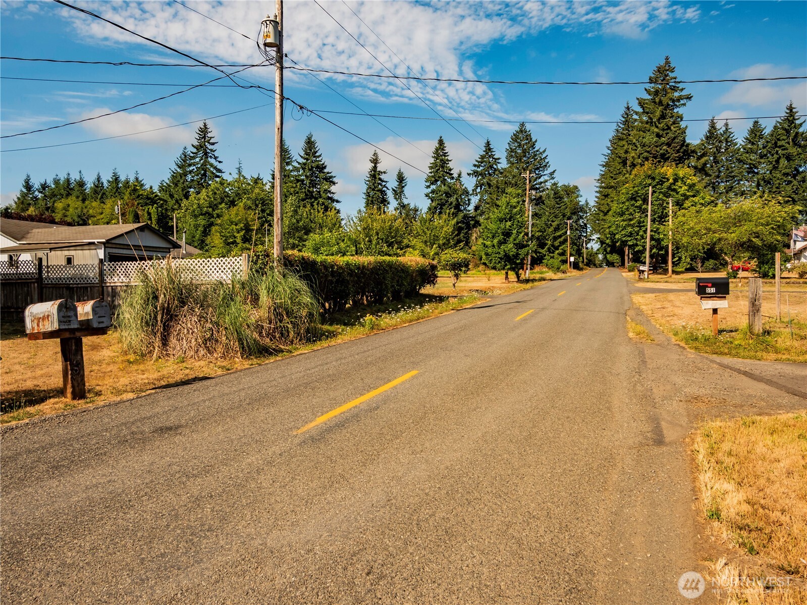 500 Mill Creek Road Southeast Shelton, WA 98584 - Photo 8 of 39 a view of a street with potted plants
