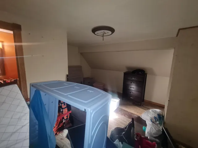 a bathroom with a sink toilet and a mirror