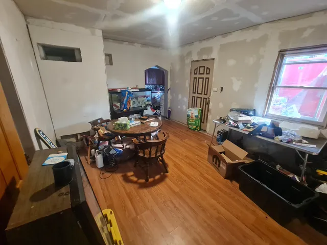 a bedroom with furniture and a bicycle