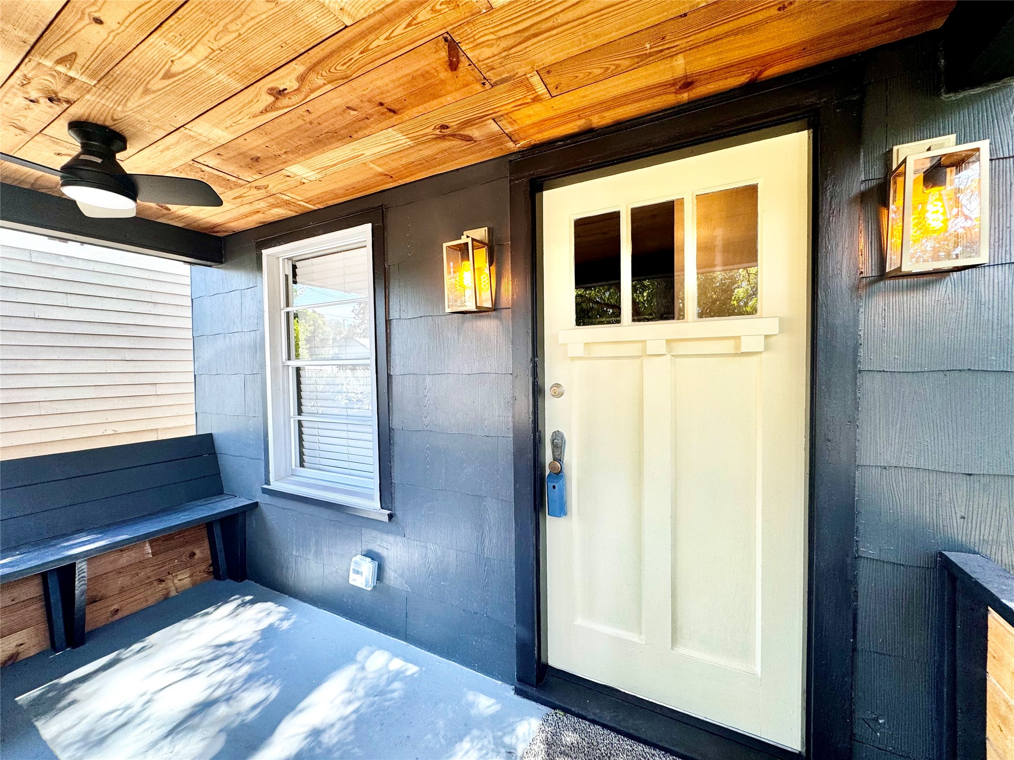 1018 Dunbar Street Houston, TX 77009 - Photo 6 of 30 Craftsman charm abounds from the reclaimed shiplap used for the ceiling and the vintage Craftsman door!