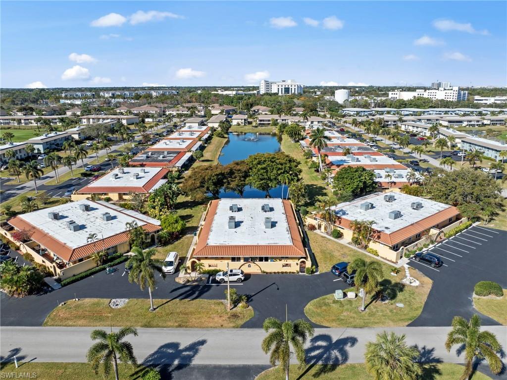 180 Harrison Road, Unit G4 Naples, FL 34112 - Photo 32 of 46 an aerial view of a city