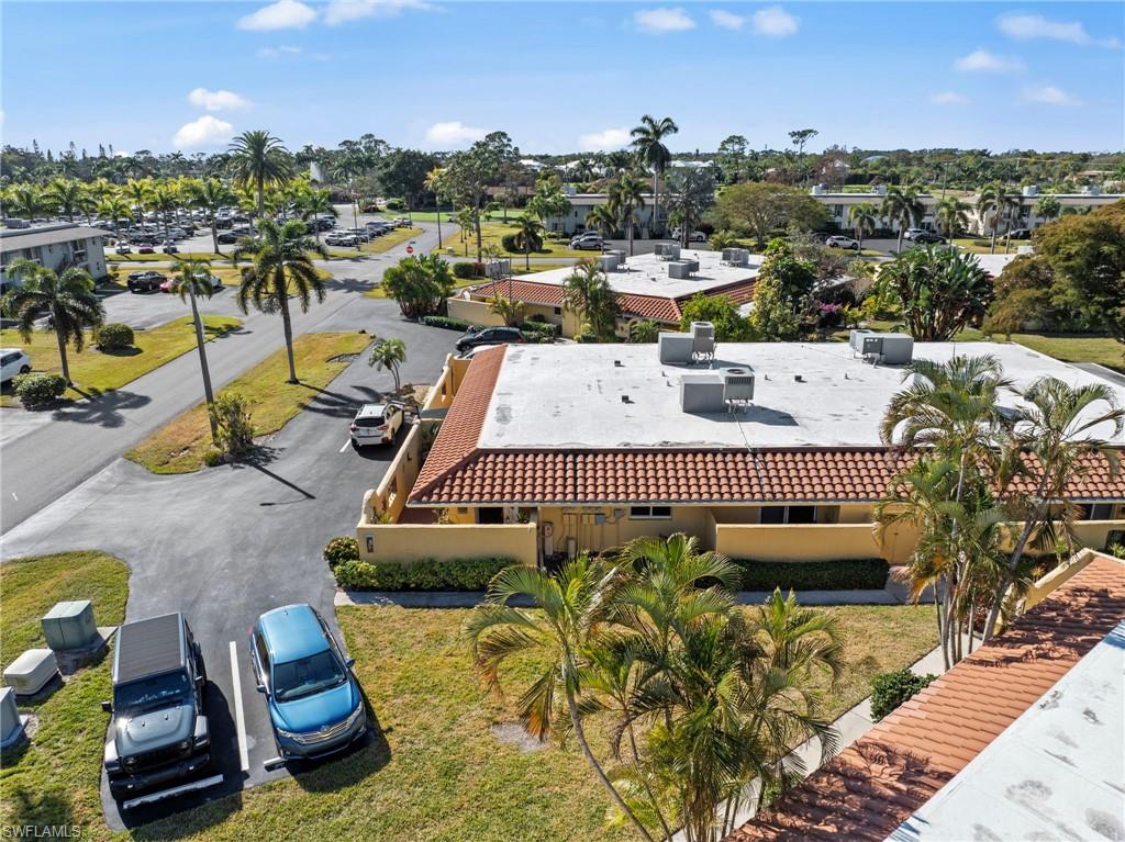 180 Harrison Road, Unit G4 Naples, FL 34112 - Photo 4 of 46 an aerial view of a house