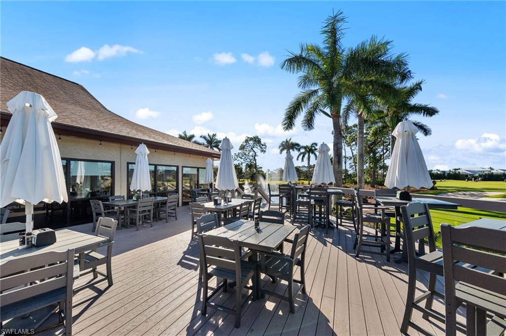 180 Harrison Road, Unit G4 Naples, FL 34112 - Photo 41 of 46 a view of a dinning table and chairs in patio of the house
