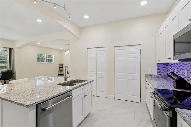 a bathroom with a shower and a sink