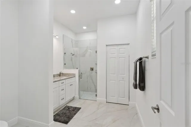 an empty room with closet area