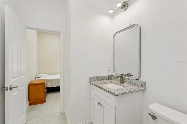 a view of a house with backyard and garden