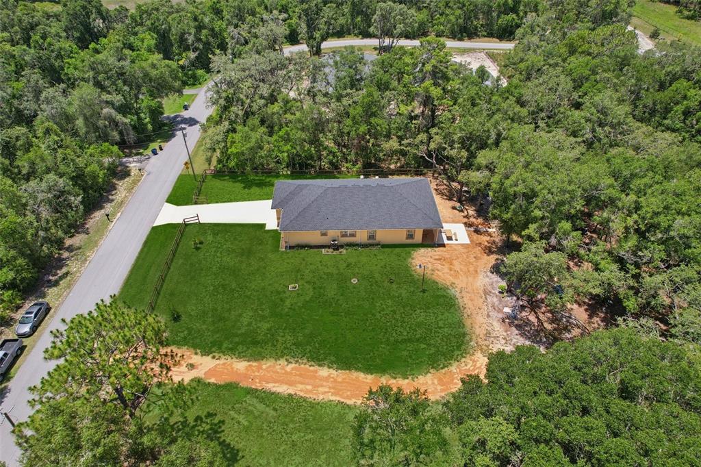 33433 Loop Court Webster, FL 33597 - Photo 66 of 69 a view of backyard with green space