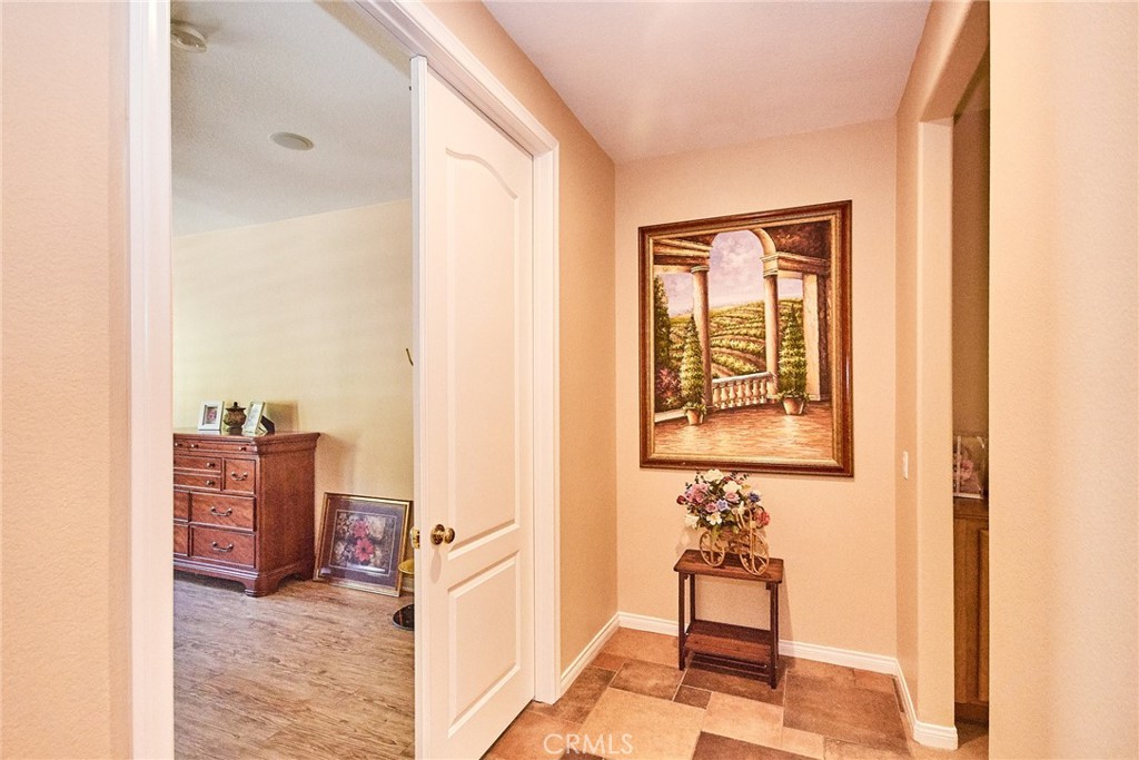 12430 Split Rein Drive Rancho Cucamonga, CA 91739 - Photo 23 of 29 a view of a livingroom with furniture and windows