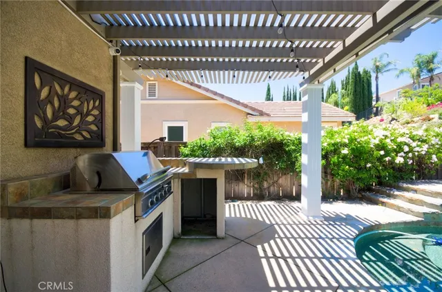 a view of a porch with furniture