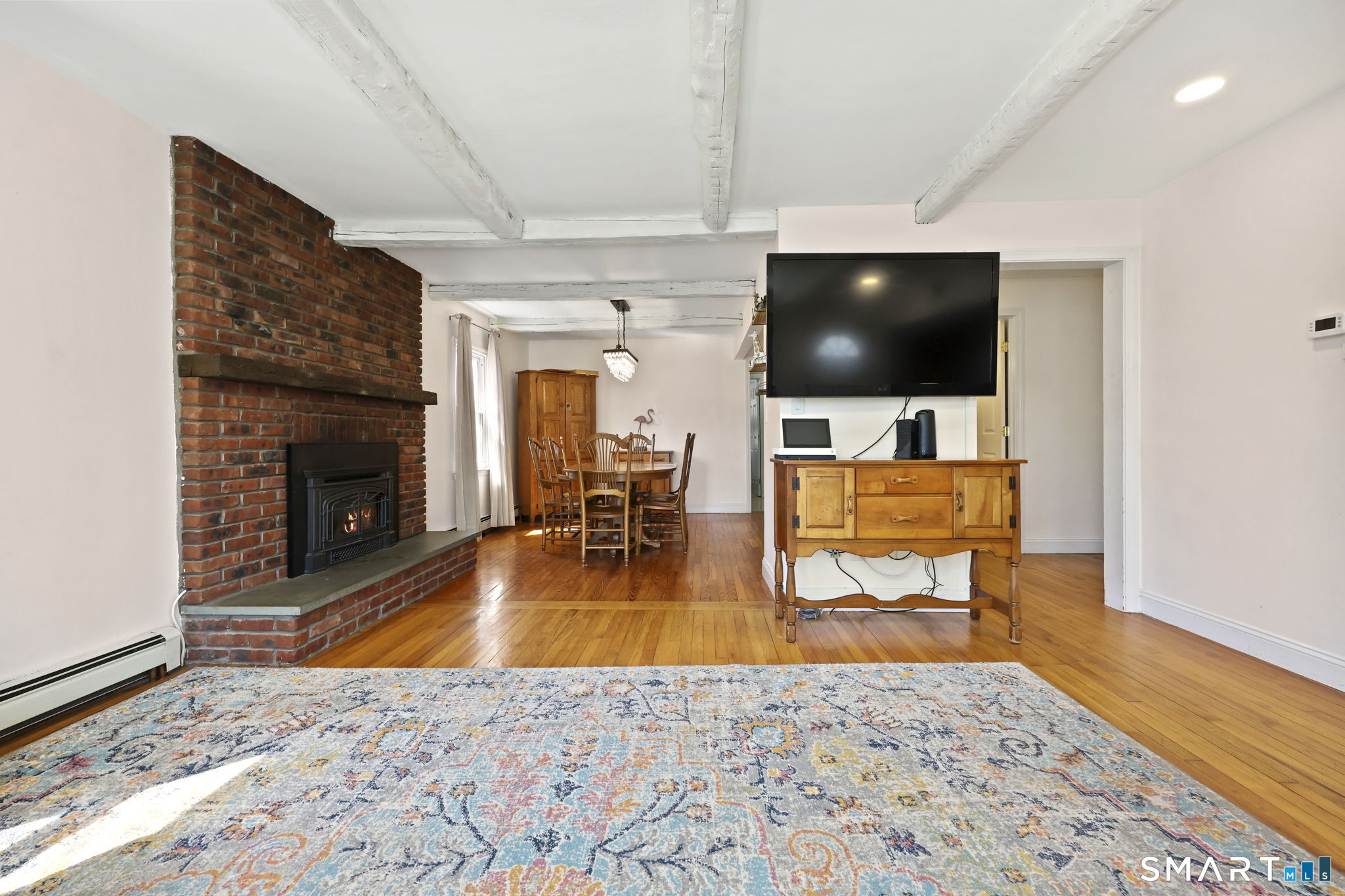 27 Lanesville Road New Milford, CT 06776 - Photo 11 of 38 a living room with furniture and a fireplace