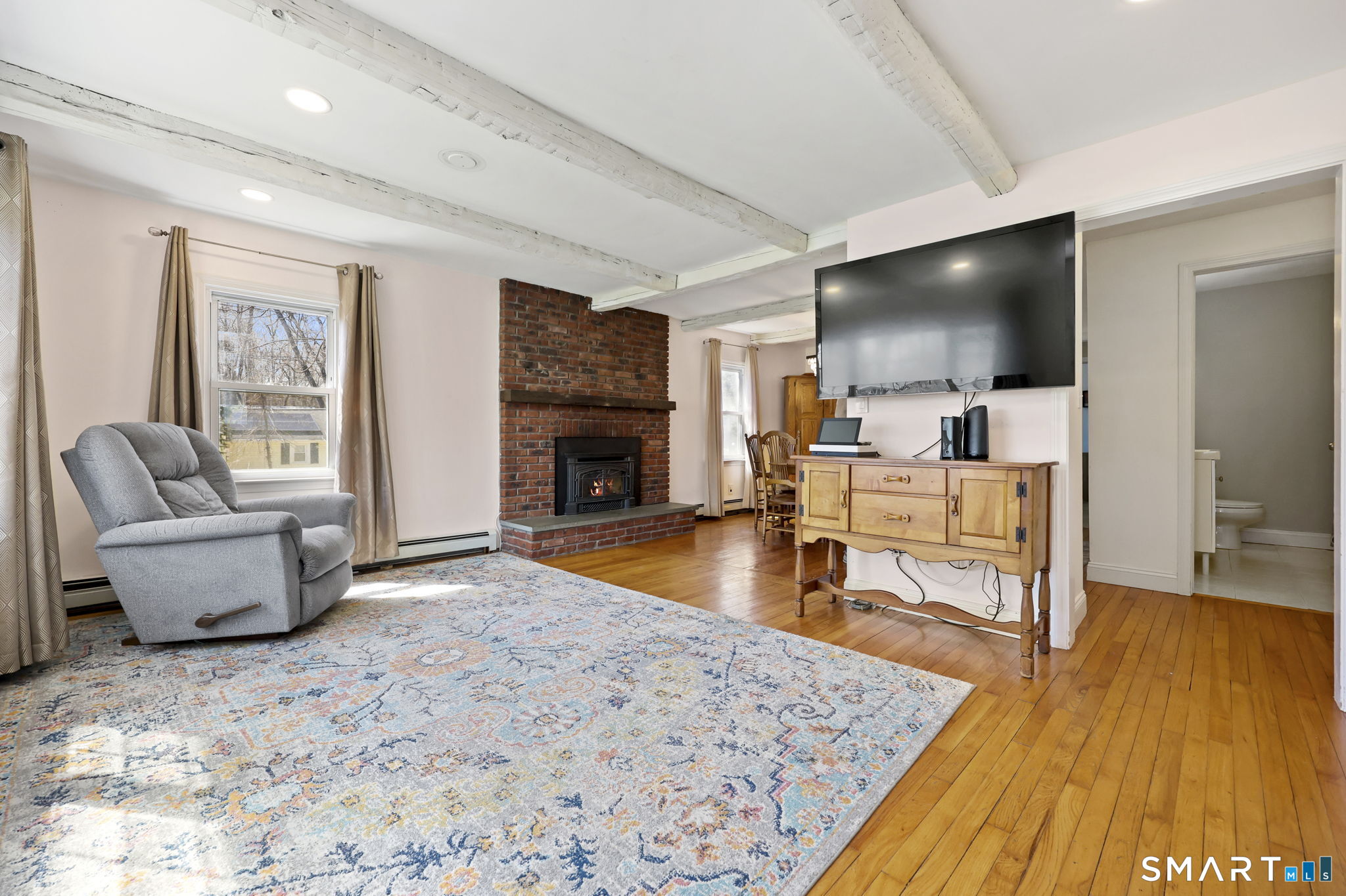 27 Lanesville Road New Milford, CT 06776 - Photo 12 of 38 a living room with furniture and a fireplace