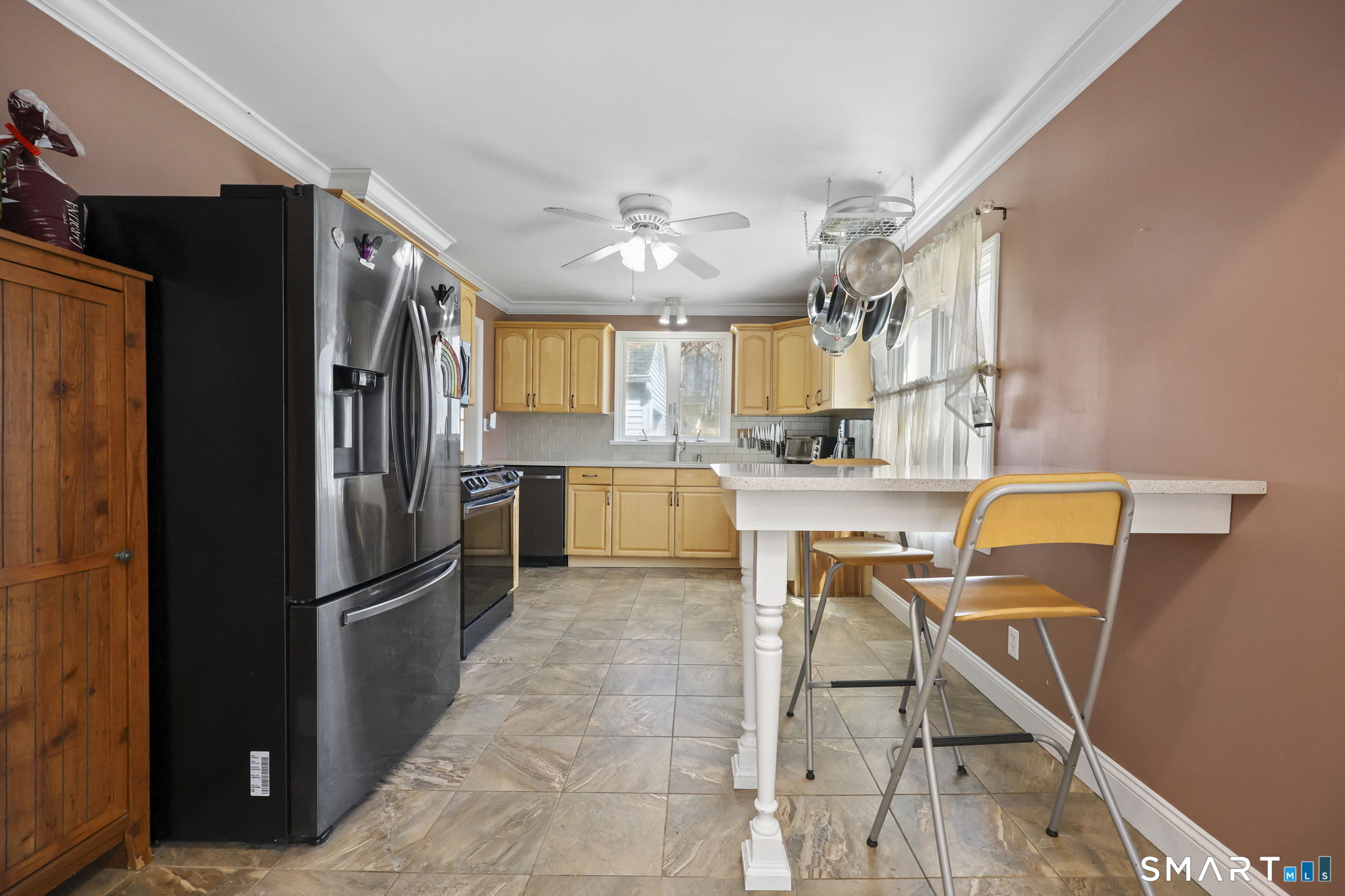27 Lanesville Road New Milford, CT 06776 - Photo 14 of 38 a kitchen with stainless steel appliances granite countertop a refrigerator and a stove