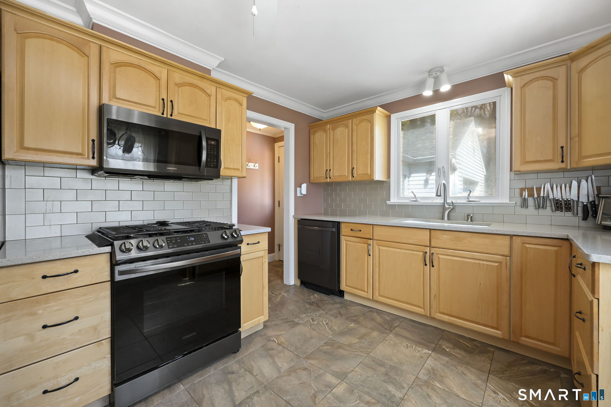 27 Lanesville Road New Milford, CT 06776 - Photo 16 of 38 a kitchen with stainless steel appliances granite countertop a stove microwave and sink