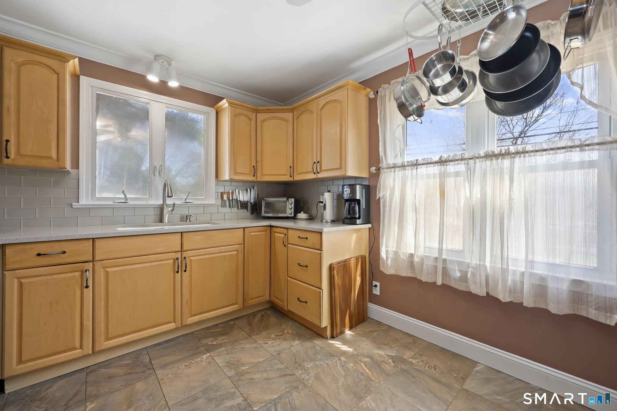 27 Lanesville Road New Milford, CT 06776 - Photo 18 of 38 a kitchen with a sink and cabinets