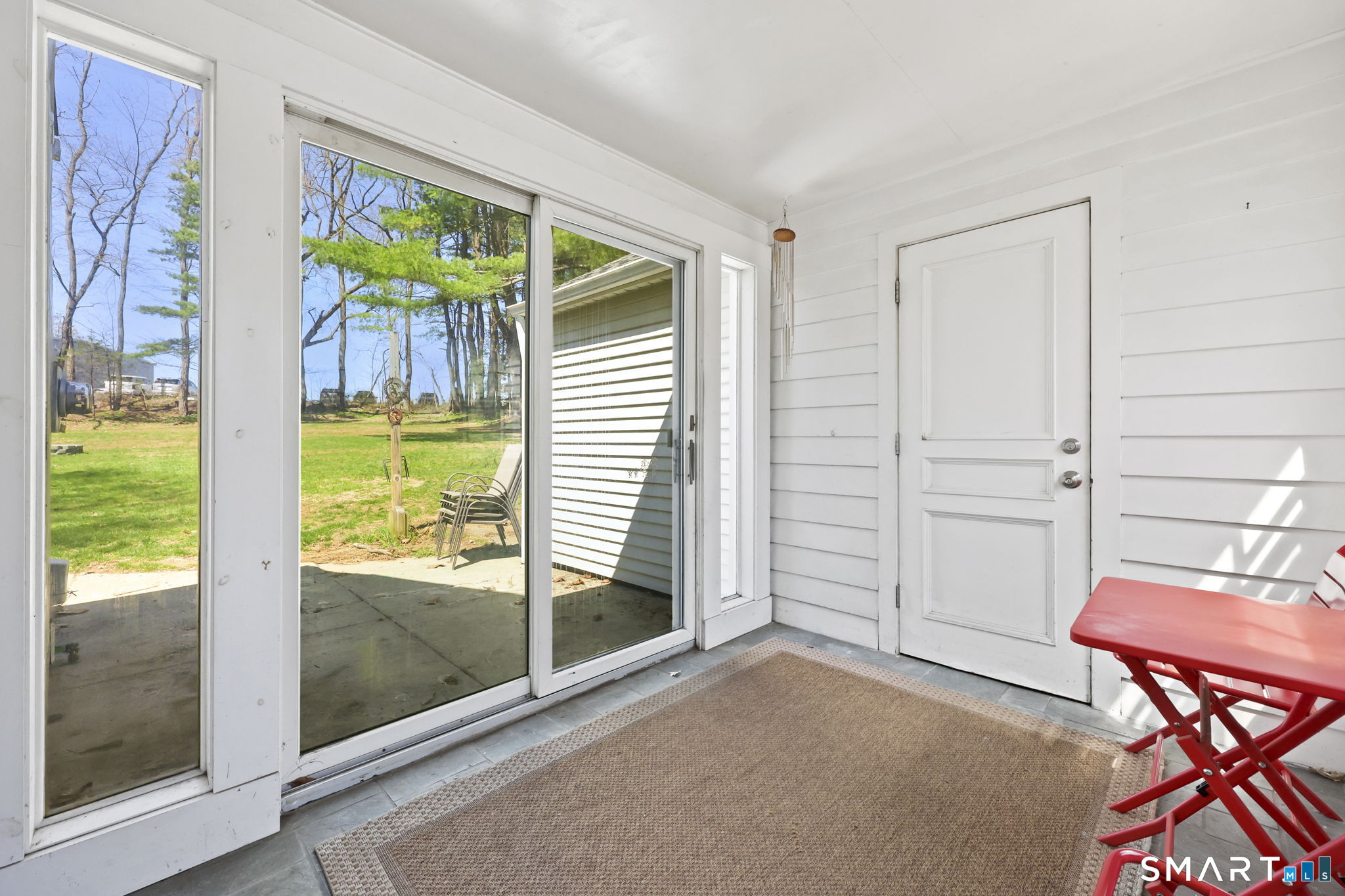 27 Lanesville Road New Milford, CT 06776 - Photo 20 of 38 a view of a room with furniture and a window