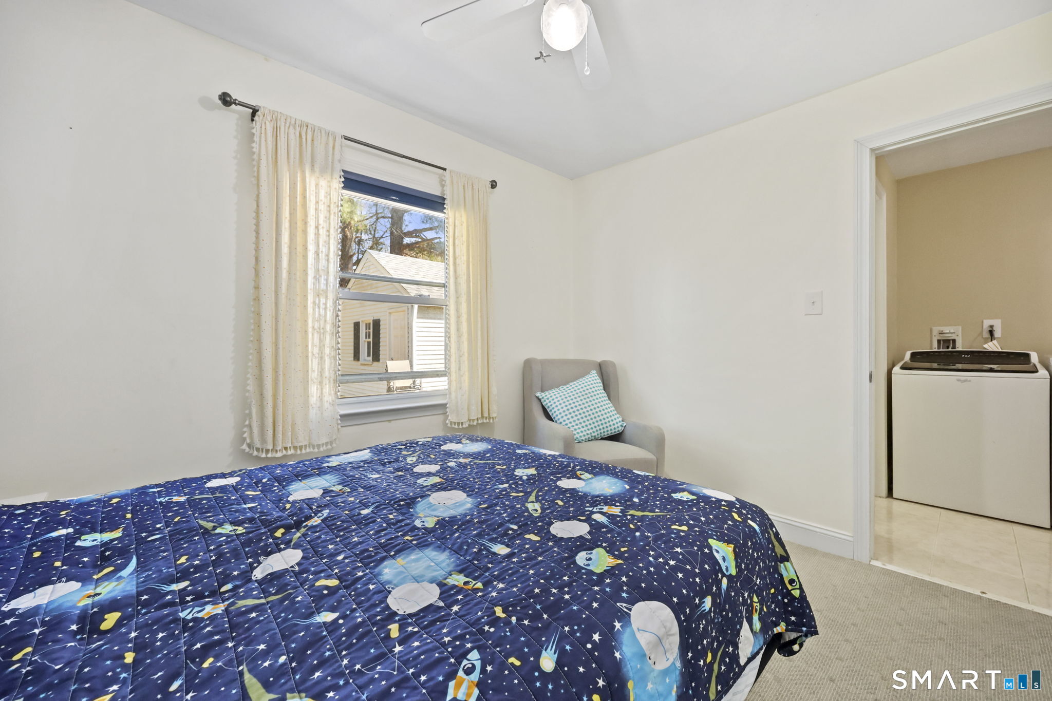 27 Lanesville Road New Milford, CT 06776 - Photo 27 of 38 a bedroom with a large bed and a chandelier