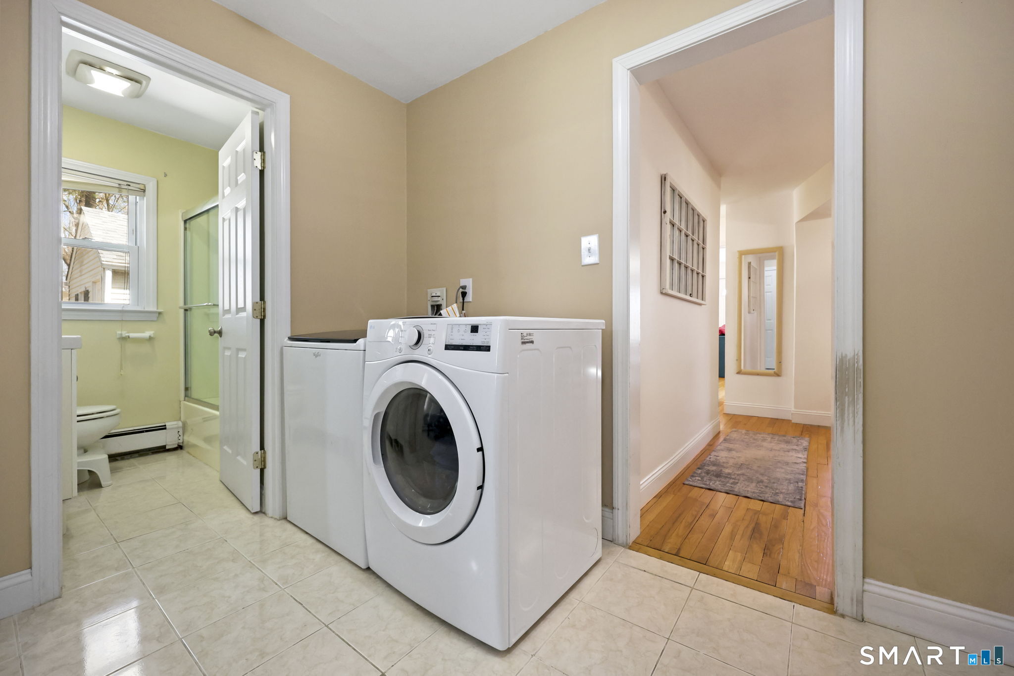 27 Lanesville Road New Milford, CT 06776 - Photo 29 of 38 a view of a hallway with washer and dryer
