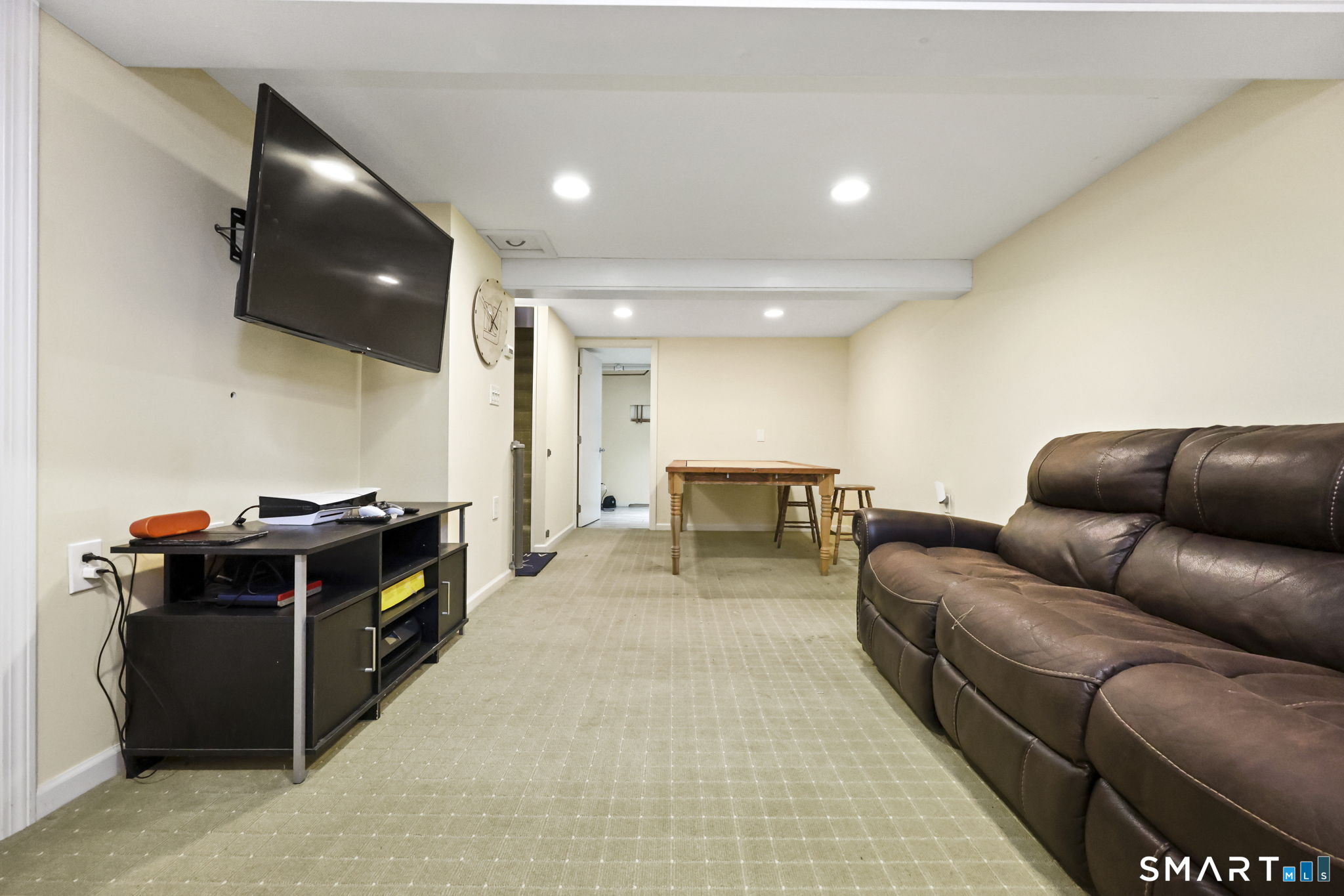 27 Lanesville Road New Milford, CT 06776 - Photo 33 of 38 a living room with furniture and a flat screen tv